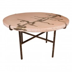 Circular pink concrete and bronze table
